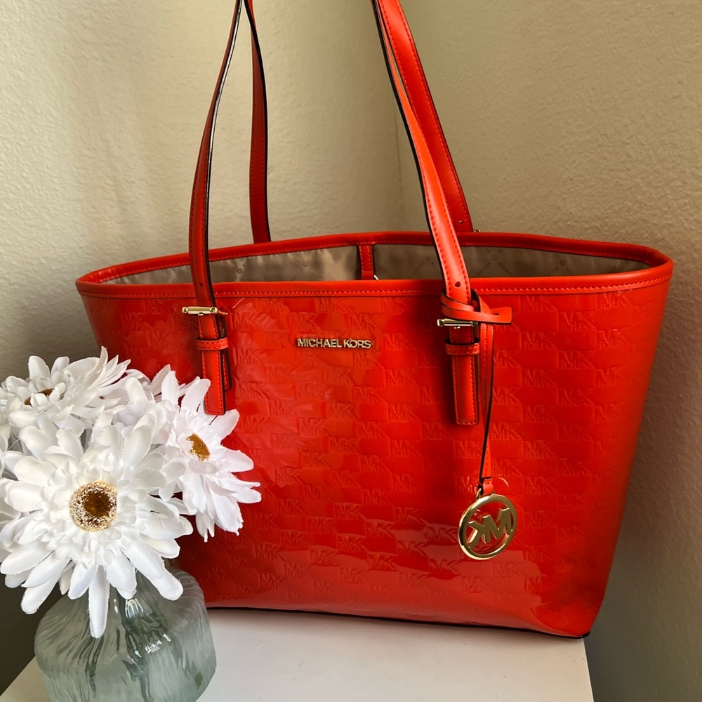 Semi New Red Michael Kors purse.